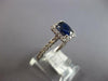 .97CT DIAMOND & AAA SAPPHIRE 18K WHITE GOLD CUSHION & ROUND HALO ENGAGEMENT RING