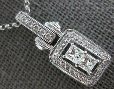 .93CT DIAMOND 18KT WHITE GOLD PRINCESS & ROUND HALO RECTANGULAR FLOATING PENDANT
