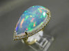 ESTATE EXTRA LARGE 8.13CT DIAMOND & AAA OPAL 14KT YELLOW GOLD CLASSIC HALO RING