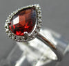1.22CT DIAMOND & AAA GARNET 14KT WHITE GOLD 3D PEAR SHAPE & ROUND HALO FUN RING