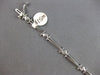 .26CT DIAMOND 14KT WHITE GOLD ROUND BEZEL ETOILE TRIANGULAR FUN TENNIS BRACELET