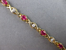 2.66CT DIAMOND & AAA RUBY 14KT YELLOW GOLD ROUND & OVAL XO LOVE TENNIS BRACELET