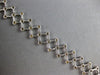 ESTATE .52CT DIAMOND 14K WHITE GOLD BEZEL ETOILE CRISS CROSS FUN TENNIS BRACELET