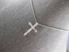 .33CT DIAMOND 18KT WHITE GOLD 3D CLASSIC ROUND & BAGUETTE CROSS FLOATING PENDANT