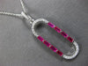 .74CT DIAMOND & AAA RUBY 14K WHITE GOLD 3D BAGUETTE & ROUND FUN FLOATING PENDANT