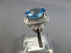 3.53CT DIAMOND & AAA BLUE TOPAZ 14KT WHITE GOLD OVAL & ROUND HALO LOVE KNOT RING