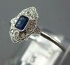SMALL .31CT DIAMOND & AAA SAPPHIRE 18KT WHITE GOLD EMERALD CUT & ROUND FUN RING