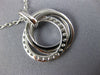 ESTATE .55CT DIAMOND 18KT WHITE GOLD CIRCLE OF LIFE INTERTWINING TRINITY PENDANT
