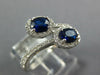 WIDE 1.23CT DIAMOND & AAA SAPPHIRE 18KT WHITE GOLD OVAL & ROUND CRISS CROSS RING