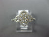 ESTATE .53CT DIAMOND 14KT TWO TONE GOLD 3D CLUSTER MARQUISE SHAPE LOVE KNOT RING