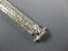 WIDE 4.80CT DIAMOND 18KT WHITE GOLD ROUND & BAGUETTE LOVE KNOT TENNIS BRACELET