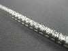 ESTATE WIDE 6.65CT PRINCESS CUT DIAMOND 18KT WHITE GOLD CLASSIC TENNIS BRACELET