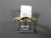 ESTATE .15CT DIAMOND 14K ROSE GOLD SWIRL INFINITY SEMI ETERNITY ANNIVERSARY RING