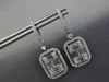 LARGE 3.17CT DIAMOND 18KT WHITE GOLD ROUND & BAGUETTE INVISIBLE HANGING EARRINGS