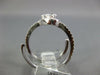 WIDE .56CT DIAMOND 18K WHITE GOLD ROUND & PEAR SHAPE CRISS CROSS LEAF SNAKE RING