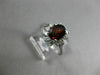 ESTATE 1.45CT DIAMOND & NATURAL GARNET 18KT WHITE GOLD OVAL HALO ENGAGEMENT RING