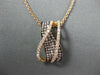 LARGE .75CT WHITE & PINK DIAMOND 18KT ROSE & BLACK GOLD CRISS CROSS WAVE PENDANT