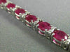 ESTATE WIDE 12.22CT DIAMOND & RUBY 18K WHITE GOLD CLASSIC OVAL TENNIS BRACELET