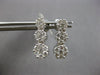1.0CT DIAMOND 14KT WHITE GOLD 3D MULTI FLOWER JOURNEY SCREWBACK HANGING EARRINGS