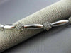 ESTATE LONG 1.40CT DIAMOND 14KT WHITE GOLD 3D FLOWER BY THE YARD TENNIS BRACELET
