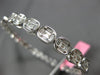 2.02CT DIAMOND 18KT WHITE GOLD OVAL INVISIBLE SEMI ETERNITY CUFF BANGLE BRACELET