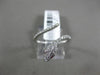 ESTATE .27CT DIAMOND & AAA RUBY 18KT WHITE GOLD 3D CRISS CROSS SNAKE FUN RING
