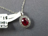 SMALL .62CT DIAMOND & AAA RUBY 18KT WHITE GOLD 3D ROUND & OVAL FLOWER PENDANT