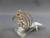 WIDE .48CT DIAMOND 14KT WHITE & ROSE GOLD MULTI ROW CRISS CROSS LOVE KNOT RING