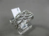 ESTATE WIDE .80CT DIAMOND 18K WHITE GOLD CRISS CROSS SEMI ETERNITY INFINITY RING