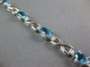 LONG 5.05CT DIAMOND & AAA BLUE TOPAZ 14KT WHITE GOLD OVAL X LOVE TENNIS BRACELET
