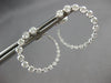 2.09CT DIAMOND 18KT WHITE GOLD GRADUATING JOURNEY SIDEWAYS HOOP HANGING EARRINGS