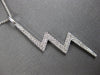 ESTATE LARGE .02CT DIAMOND 18K WHITE GOLD ZIG ZAG LIGHTNING FUN FLOATING PENDANT