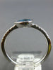 .65CT DIAMOND & AAA BLUE TOPAZ 14KT WHITE GOLD PEAR SHAPE & ROUND BEZEL FUN RING