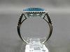 ESTATE 1.56CT DIAMOND & AAA OVAL BLUE TOPAZ 14KT WHITE GOLD HALO FILIGREE RING