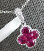 SMALL .78CT DIAMOND & AAA RUBY 18KT WHITE GOLD INVISIBLE 4 LEAF CLOVER PENDANT