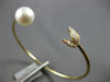 ESTATE .22CT DIAMOND & SOUTH SEA PEARL 14KT YELLOW GOLD FLEXIBLE BANGLE BRACELET