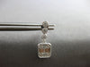ESTATE .45CT DIAMOND 14KT WHITE GOLD ROUND & BAGUETTE INVISIBLE HANGING EARRINGS