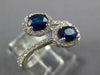 WIDE 1.23CT DIAMOND & AAA SAPPHIRE 18KT WHITE GOLD OVAL & ROUND CRISS CROSS RING