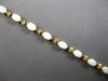 4.6CT DIAMOND & AAA OPAL 14KT YELLOW GOLD OVAL & ROUND ETERNITY BRACELET 28192