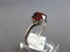 1.17CT DIAMOND & AAA GARNET 14KT WHITE GOLD 3D CUSHION & ROUND 3 STONE LOVE RING