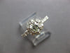 ESTATE .73CT DIAMOND 18KT WHITE GOLD 3D ROUND FLOWER ENGAGEMENT RING