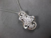 EXTRA LARGE 2.55CT DIAMOND 18KT WHITE GOLD ROUND & BAGUETTE FLORAL LOVE PENDANT