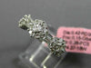 ESTATE .85CT ROUND & BAGUETTE DIAMOND 18KT WHITE GOLD 3 FLOWER ANNIVERSARY RING