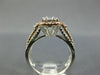 .82CT DIAMOND 14KT WHITE & ROSE GOLD 3D ROUND & BAGUETTE HALO ENGAGEMENT RING
