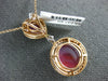 7.73CT BLACK DIAMOND & AAA SLICED RUBY 18KT ROSE GOLD CIRCULAR TEAR DROP PENDANT