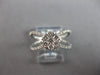ESTATE LARGE .64CT DIAMOND 14KT WHITE GOLD FLOWER CRISS CROSS INFINITY LOVE RING