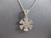 ESTATE .63CT DIAMOND 14KT WHITE GOLD 3D ROUND & BAGUETTE FLOWER FLOATING PENDANT