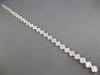 ESTATE WIDE & LONG 5.34CT DIAMOND 18KT WHITE GOLD CLUSTER CLOVER TENNIS BRACELET