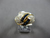1.20CT DIAMOND & AAA SAPPHIRE 18KT YELLOW GOLD ROUND & BAGUETTE CRISS CROSS RING