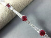 ESTATE 4.28CT DIAMOND & AAA RUBY 18KT WHITE GOLD CLASSIC JOURNEY TENNIS BRACELET